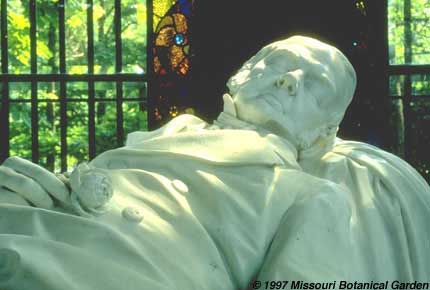 Another photographic view of the marble effigy and stained glass windows of mausoleum