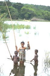 Woman and children fishing