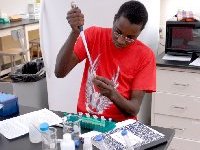 Livingstone Nganga extracting DNA
