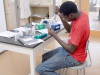 Livingstone Nganga extracting DNA