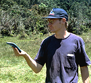 Student holding GPS unit